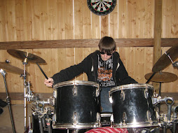 Steven playing his beloved drums