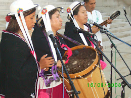 Performers singing in Quechua
