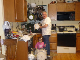 Helping Papa Roger with the dishes!