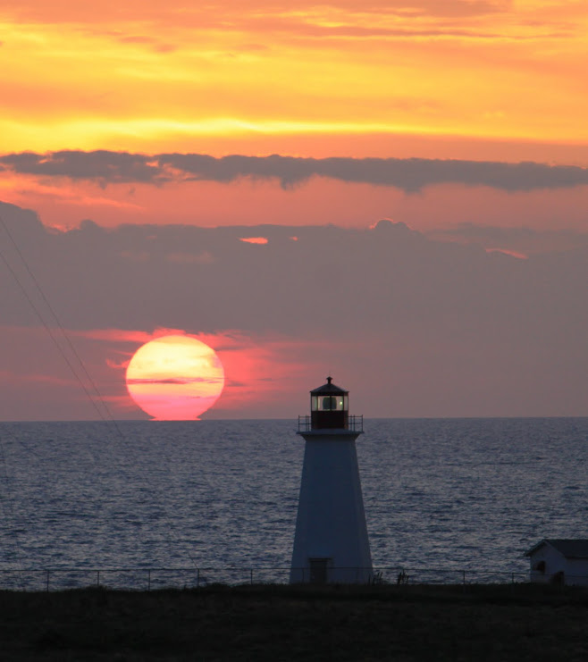 Sunset Cheticamp Lighthouse NS