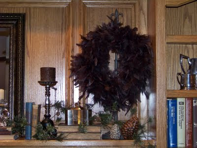 used one of these wire wreath forms and a chocolate feather boa from 