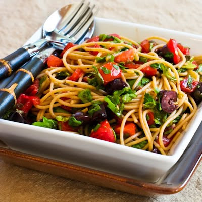Whole What Spagetti with No-Cook Sauce of Tomatoes, Arugula, Olives, and Capers
