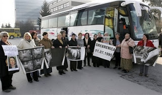 A bus carrying some 50 relatives of Srebrenica victims prepare to leave Sarajevo in Bosnia early Saturday, Feb. 24, 2007 for the Netherlands to attend Monday's verdict by the International Court of Justice in a genocide case against Serbia and Montenegro in the Hague. Bosnia-Herzegovina filed the case in 1993 — the first time a state, rather than individuals, had been charged with genocide. In case it wins, it hopes later to seek compensation for the loss of life and property during the 1992-95 war, when an estimated 200,000 people were killed and when entire Muslim Bosniak towns and villages were devastated
