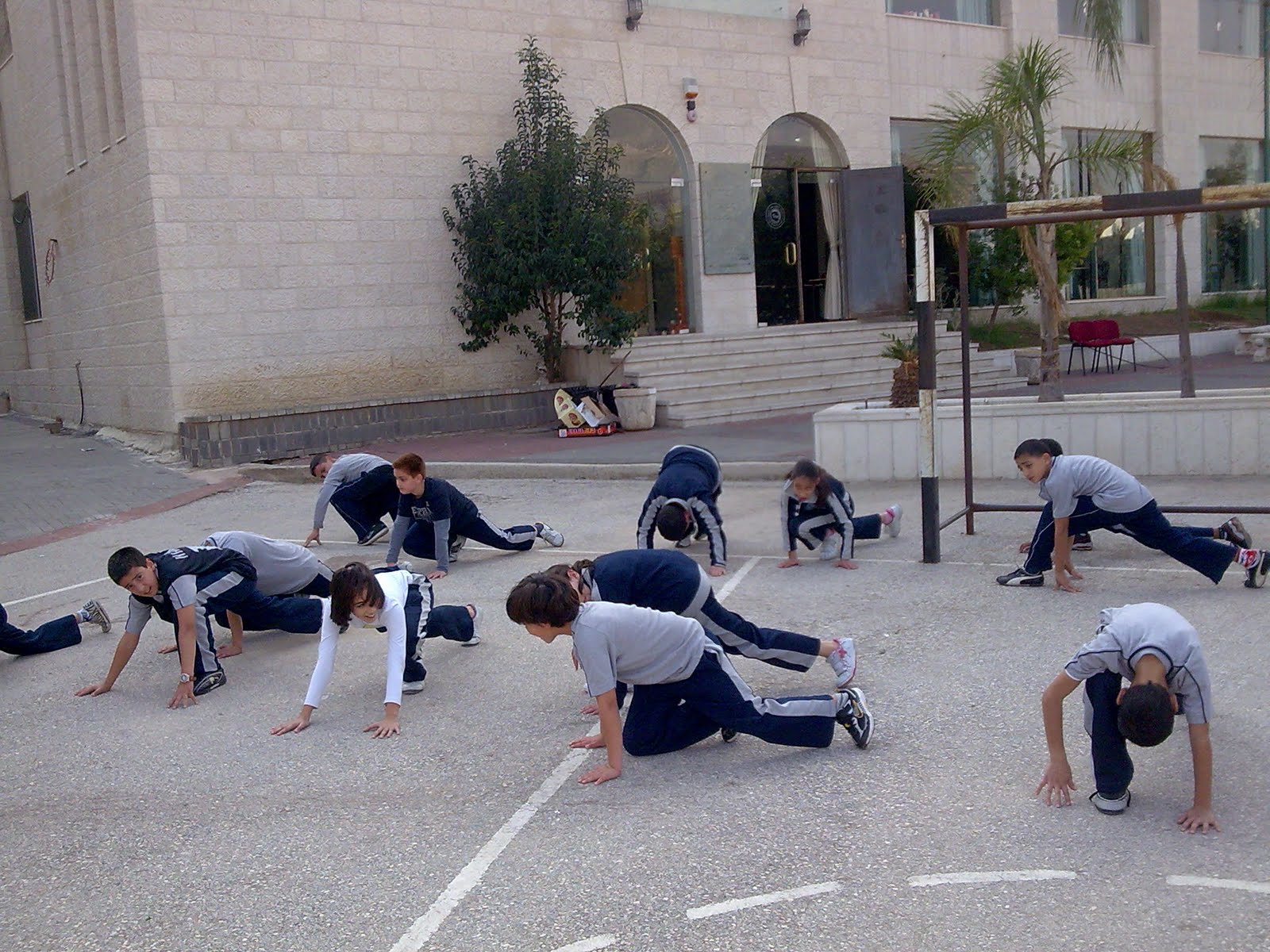 Mrs.Victoria Blog Grade 5. Stretch exercises before basketball game.
