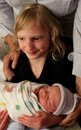 Layla holding Judah for the first time
