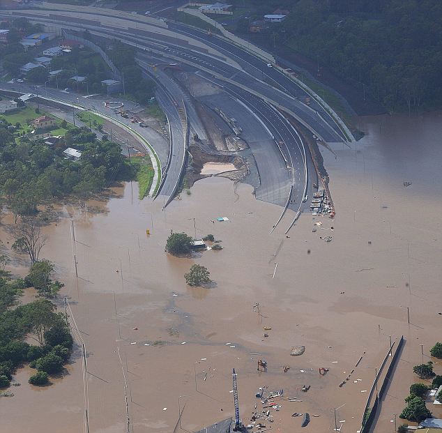 Death toll in Australia floods reaches 22 as water in Brisbane