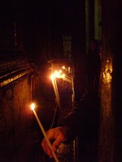 JERUSALEM - Candles being lit beside Christ's Tomb / @JDumas