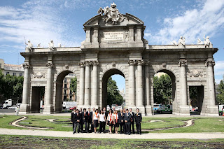 The Alcala gate in madrid with all the team