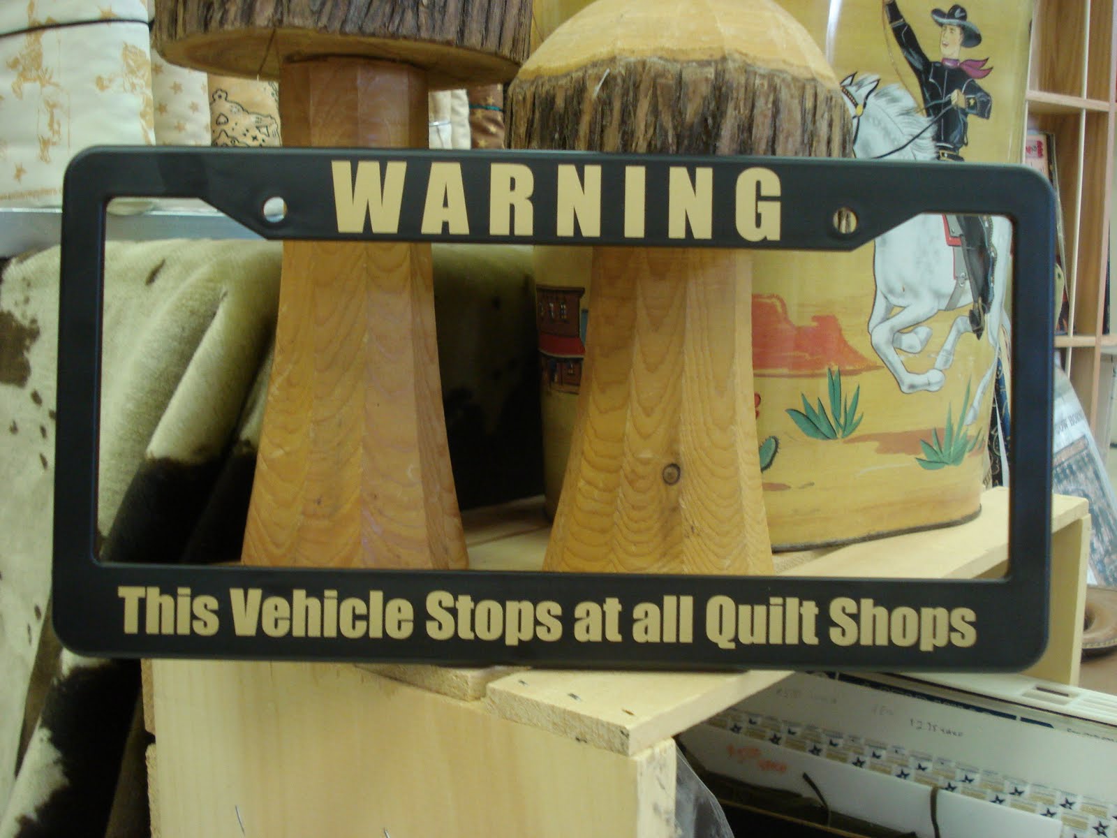 Sewing on the Moon Quilters' License Plate Frames are in the Store!