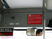 The front of the bus, with the bus stopping bell on the left, . (img )