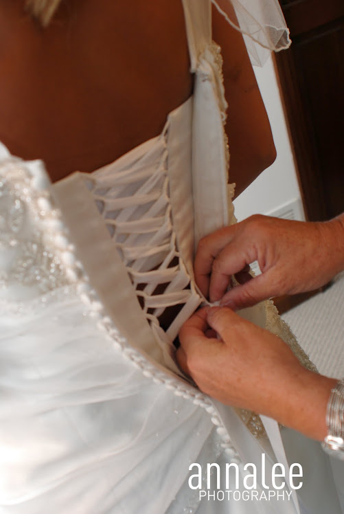 mom helping bride