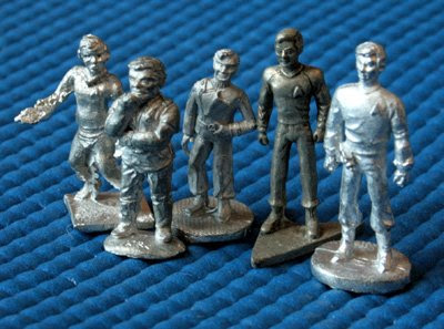 Various Star Trek miniatures of James T. Kirk (click for larger)