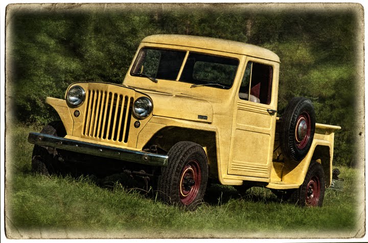 A 1948 Willys 4wd pickup sits in Lineberry North Carolina