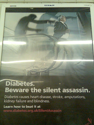 A warning poster with the message 'Diabetes causes heart disease, stroke, amputations, kidney failure and blindness'