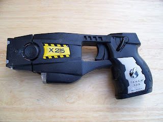 TASER picture from Wikipedia Commons: see http://commons.wikimedia.org/wiki/File:Police_issue_X26_TASER.jpg