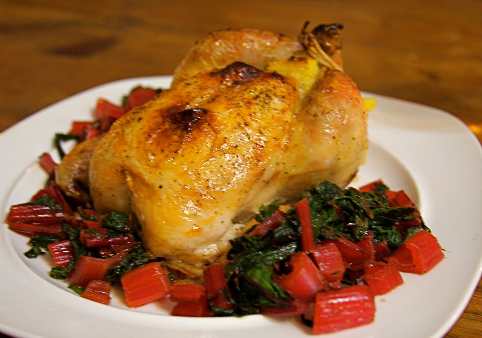 Dine Well Sage Polenta Stuffed Roasted Cornish Game Hens with Greens