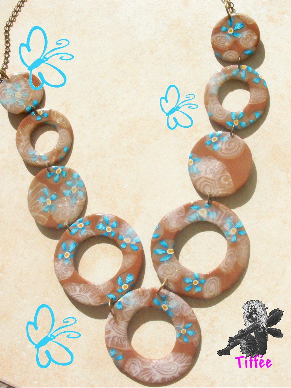 [collier+cercles+marrons+turquoises+logote.jpg]