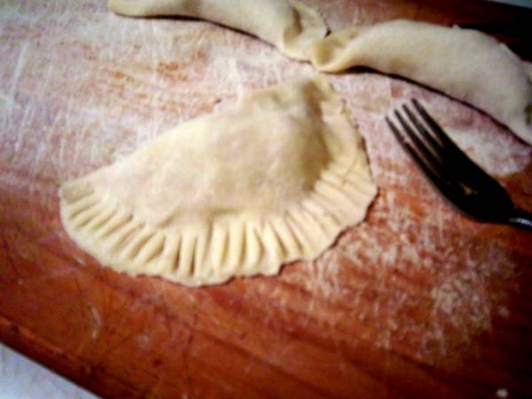 Chicken Pot Pie Pockets: Creamy chicken pot pie filling inside a tender flaky crust turned into a hand pie. The ultimate comfort food that's freezable too! - Slice of Southern