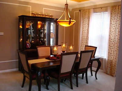 traditional dining room with floral drapes
