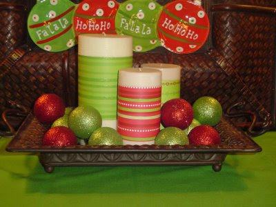 Christmas candles wrapped with scrapbook paper