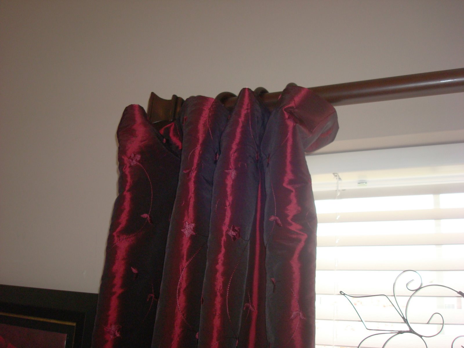 red faux silk drapes