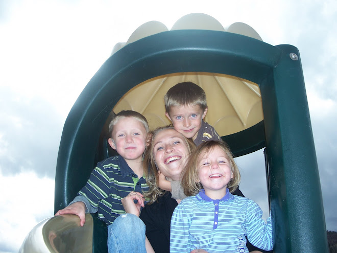 Nicole with the kids on the slide