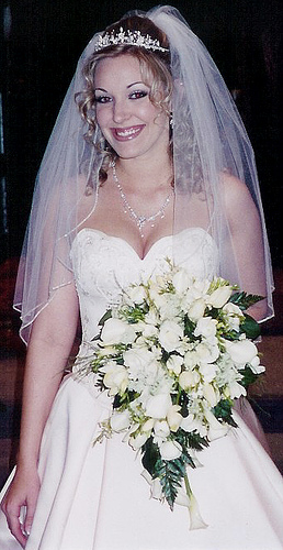 White Roses Cascading Bouquet with White Roses and Singapore orchid