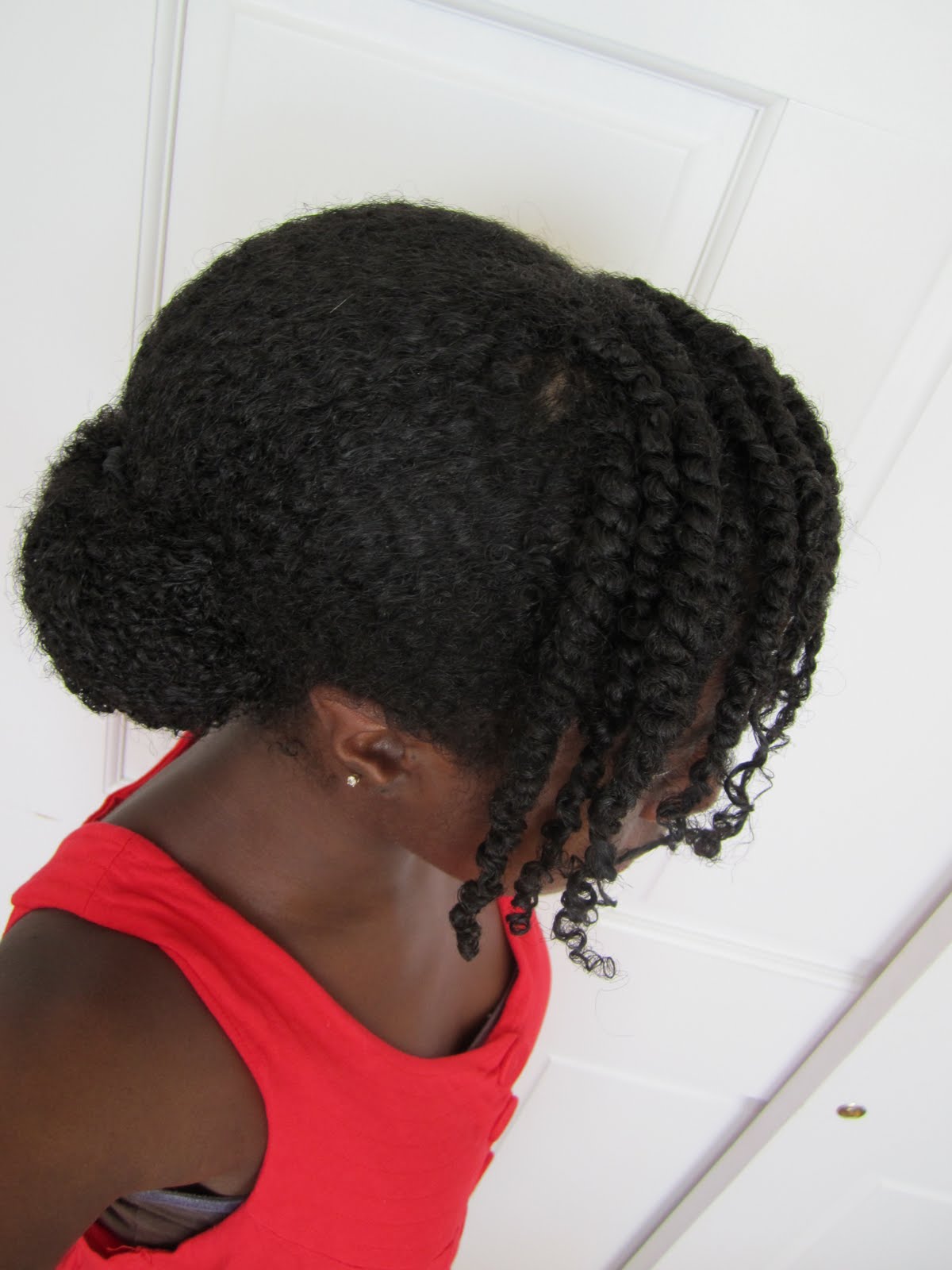 Doing It on a Budget Low Bun with Side Bang Twists