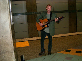 Guitar player in subway redline of Los Angeles, California
