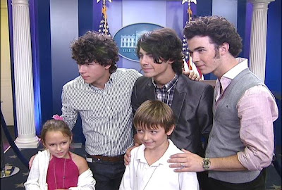 Fans pose with The Jonas Brothers at the White House Press Corps - Photo courtesy of Fox 5 News