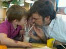 Sharing a shake with grandkids