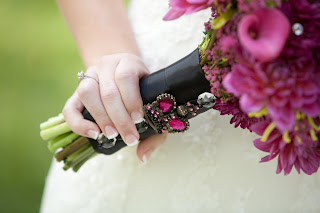 visual impact= crown brooch pink bouquet