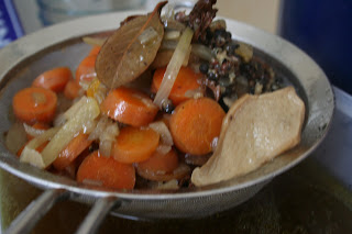 Straining the mushroom stock