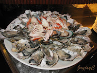 Crabs, oysters and mussels on ice