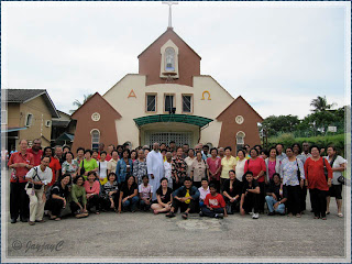 Group photo of pilgrims to the Church of St John Vianney in Tampin, Negeri Sembilan, including its Parish Priest