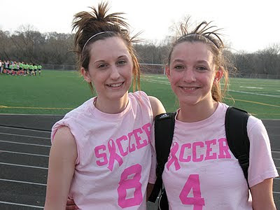 A picture of Amanda\'s daughter Kristen with her friend at soccer practice.