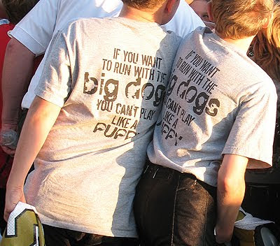 A photo of the team shirts that say “If you want to run with the big dogs, you can’t play like a puppy”.