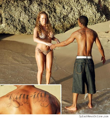 Nick Cannon sports a brand new huge tattoo that reads "Mariah".