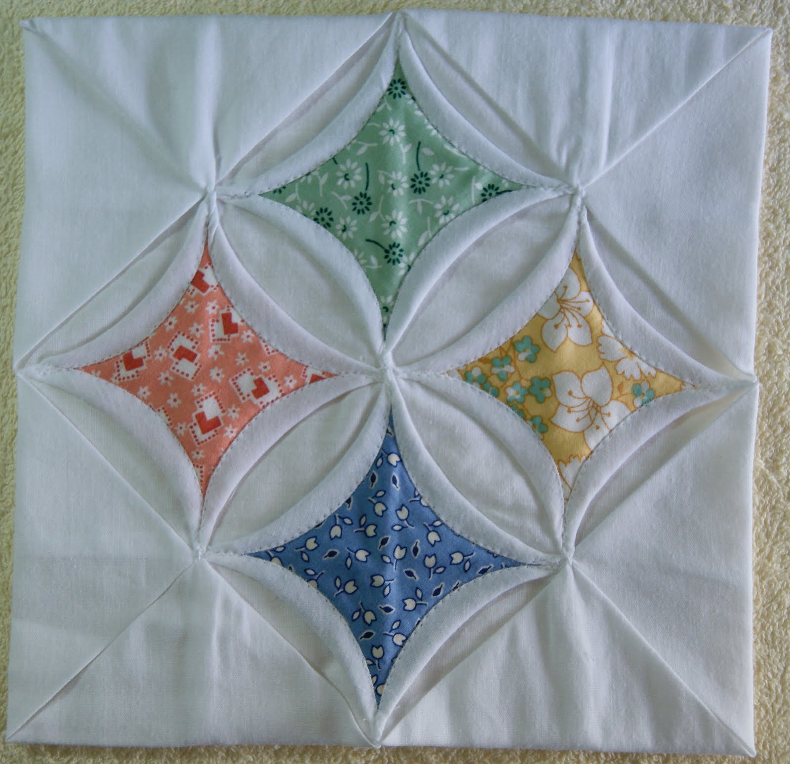 One Piece at a Time Cathedral Window Quilt