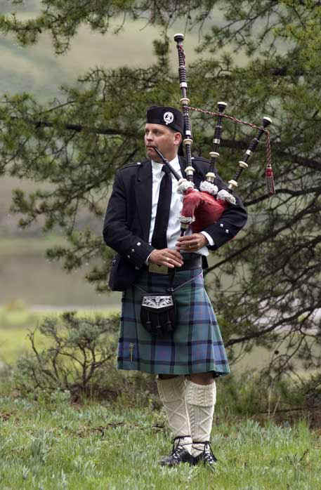 Playing bagpipes