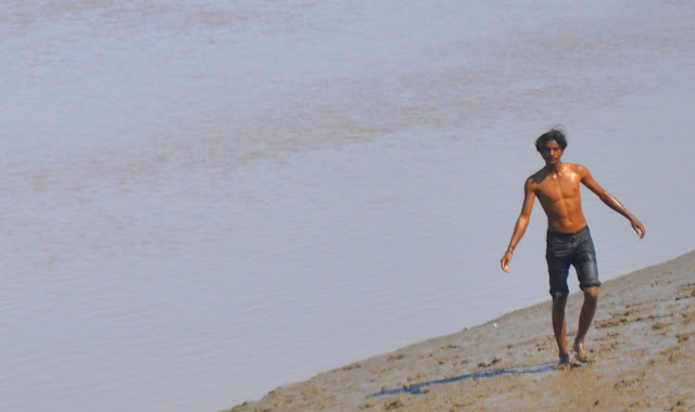 Indian man male guy bathing river bhavnagar gujarat tourism travel 