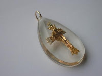 gold cross pendant