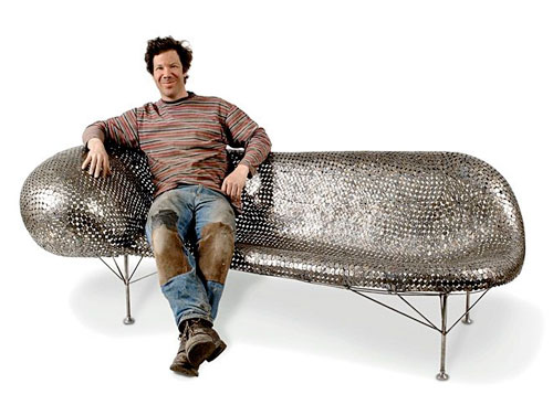 artist and welder Johnny Swing on his Nickel couch