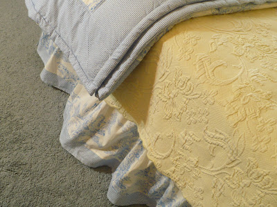 blue toile and light yellow bed comforter