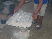 covering it with sheet metal to hold the upper fire