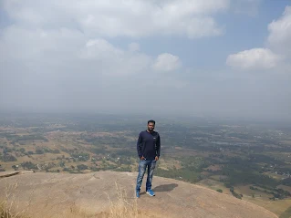 Madhu on the summit of Huthridurga Fort climb