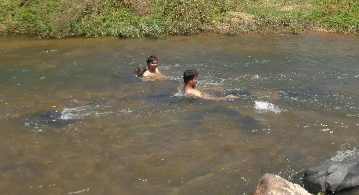 Relaxing in the flowing Kaveri river